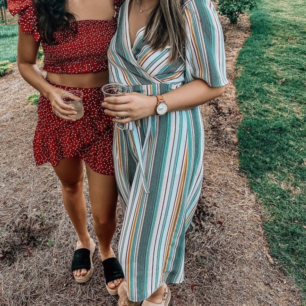 {Francesca’s} Blue, green, yellow, and white striped jumpsuit